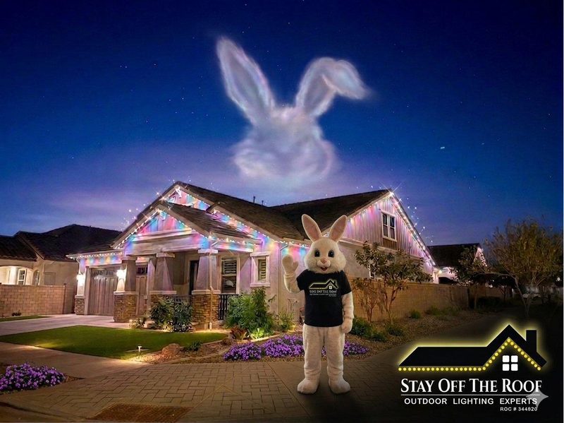 Permanent trim lights in pastel colors for Easter on a Phoenix home